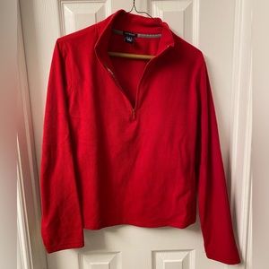 Thin, red fleece. Stretchy.